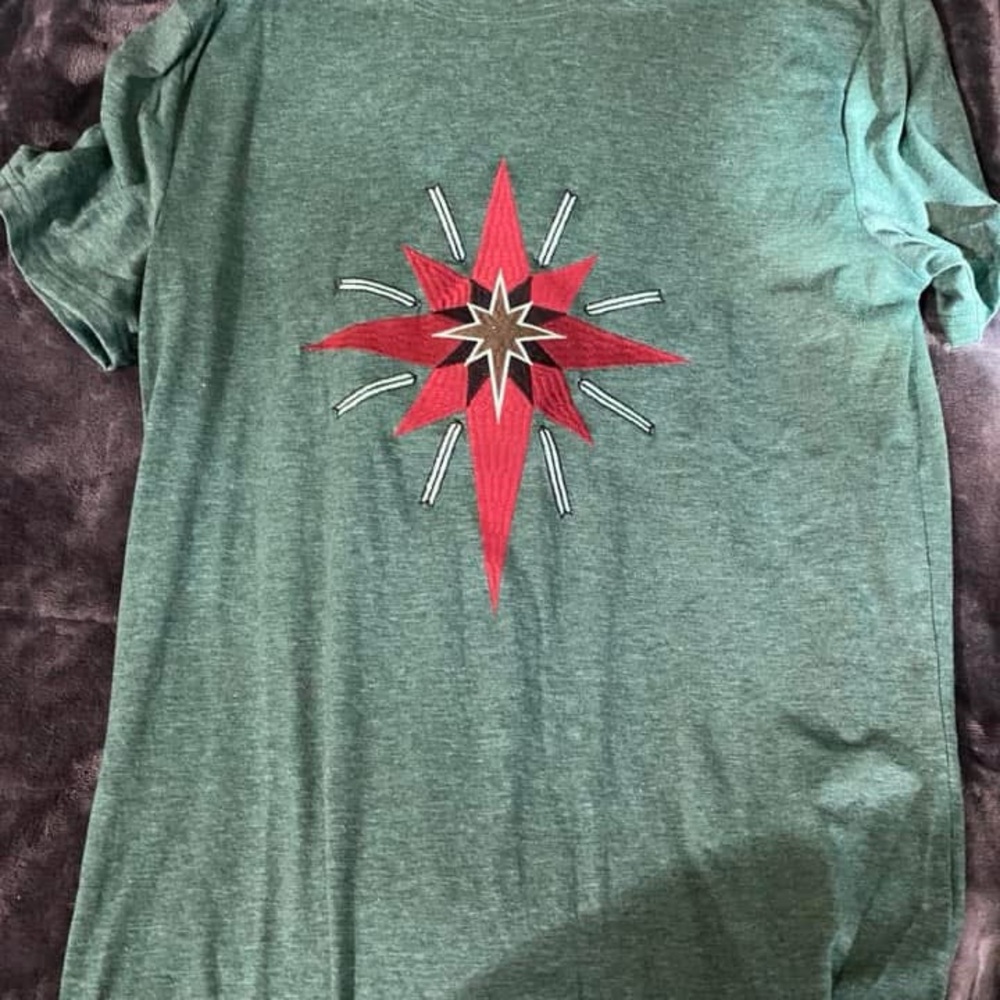 Green T-Shirt with Red Star Design